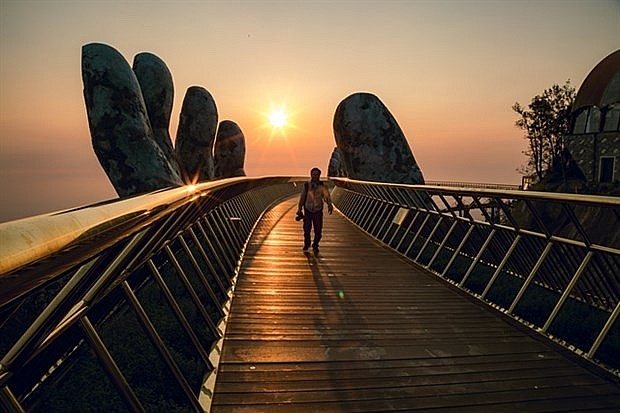 The Golden Bridge offers a check-in for tourists visiting the Sun World Ba Na Hills in Da Nang. The city has been designed as a liveable urban city. Photo: Sun Group The Golden Bridge offers a check-in for tourists visiting the Sun World Ba Na Hills in Da Nang. The city has been designed as a liveable urban city. Photo: Sun Group
