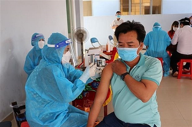 A resident in Tien Giang province gets vaccinated against Covid-19. Photo: VNA A resident in Tien Giang province gets vaccinated against Covid-19. Photo: VNA