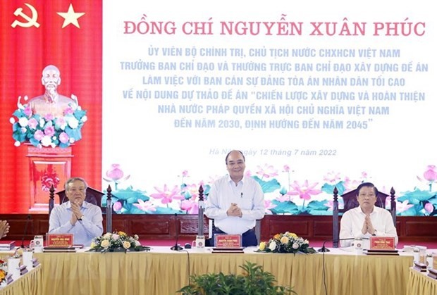 President Nguyen Xuan Phuc (centre) chairs the meeting in Hanoi on July 12. (Photo: VNA) President Nguyen Xuan Phuc (centre) chairs the meeting in Hanoi on July 12. (Photo: VNA)