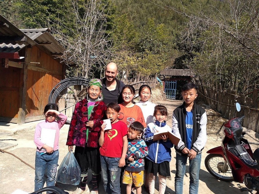 Daniel Blanco with locals on a field trip in Vietnam. Daniel Blanco with locals on a field trip in Vietnam.