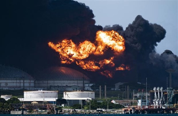 A view of the massive fire at the fuel depot, sparked overnight by a lightning strike in Matanzas in western Cuba. Photo: AFP A view of the massive fire at the fuel depot, sparked overnight by a lightning strike in Matanzas in western Cuba. Photo: AFP