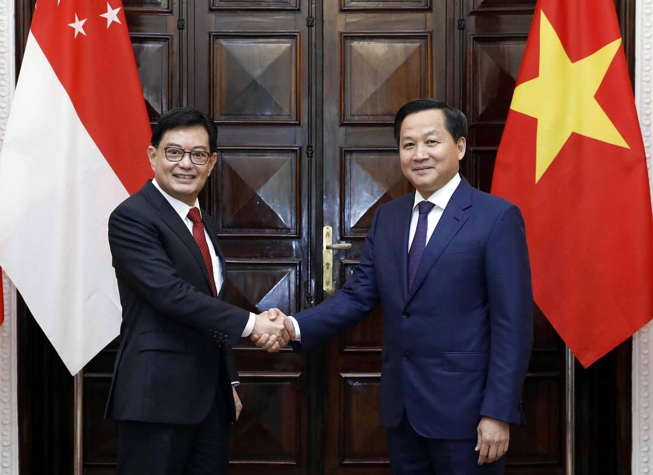 Phó Thủ tướng Lê Minh Khái đón Phó Thủ tướng, Bộ trưởng Điều phối Chính sách kinh tế Singapore Heng Swee Keat (Ảnh: TTXVN) Phó Thủ tướng Lê Minh Khái đón Phó Thủ tướng, Bộ trưởng Điều phối Chính sách kinh tế Singapore Heng Swee Keat (Ảnh: TTXVN)