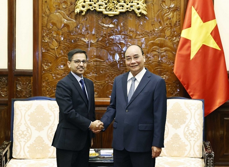 President Nguyen Xuan Phuc (R) welcomes Indian Ambassador Pranay Verma President Nguyen Xuan Phuc (R) welcomes Indian Ambassador Pranay Verma