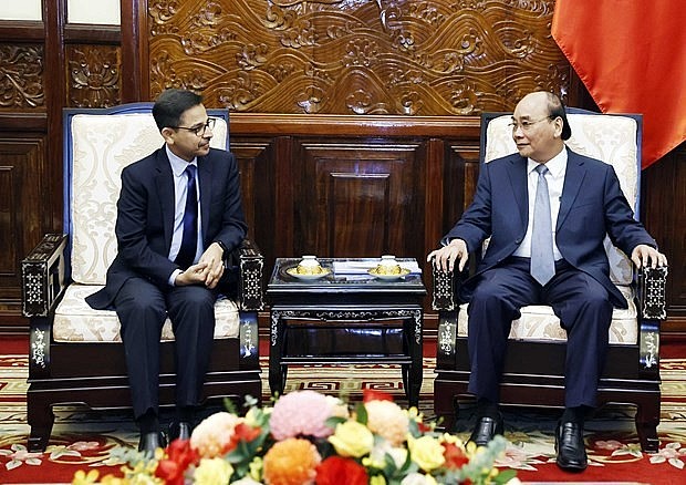 President Nguyen Xuan Phuc (R) and Indian Ambassador Pranay Verma at the meeting in Hanoi on September 20 (Photo: VNA) President Nguyen Xuan Phuc (R) and Indian Ambassador Pranay Verma at the meeting in Hanoi on September 20 (Photo: VNA)