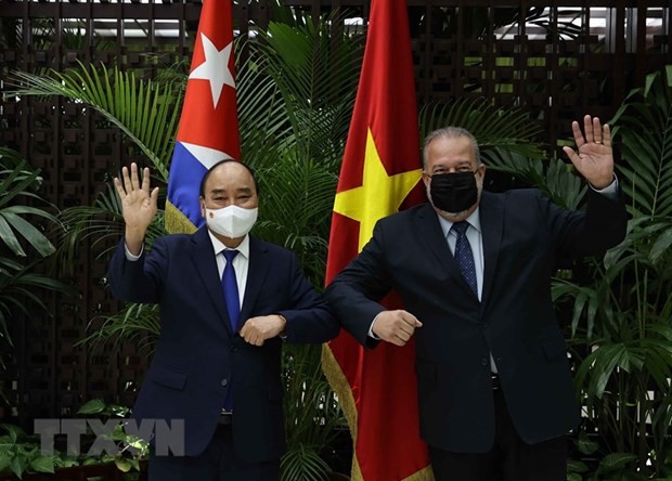 Chủ tịch nước Nguyễn Xuân Phúc hội kiến Thủ tướng Cộng hoà Cuba Manuel Marrero Cruz tại thủ đô La Habana ngày 19/9/2021 (Ảnh: Thống Nhất/TTXVN). Chủ tịch nước Nguyễn Xuân Phúc hội kiến Thủ tướng Cộng hoà Cuba Manuel Marrero Cruz tại thủ đô La Habana ngày 19/9/2021 (Ảnh: Thống Nhất/TTXVN).