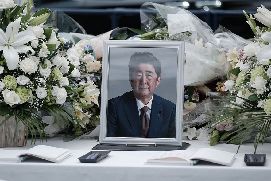 A photograph of former Prime Minister Shinzo Abe at a makeshift memorial in Tokyo, on July 11.Photographer: Soichiro Koriyama/Bloomberg A photograph of former Prime Minister Shinzo Abe at a makeshift memorial in Tokyo, on July 11.Photographer: Soichiro Koriyama/Bloomberg