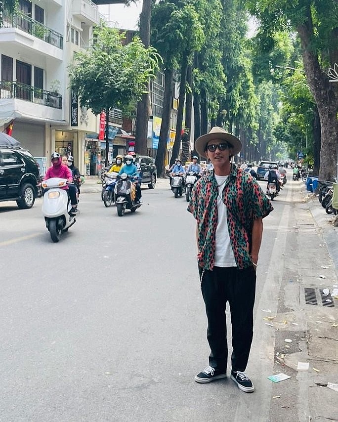 Noboru Kaneko walking the streets of Hanoi. Photo: NLD Noboru Kaneko walking the streets of Hanoi. Photo: NLD