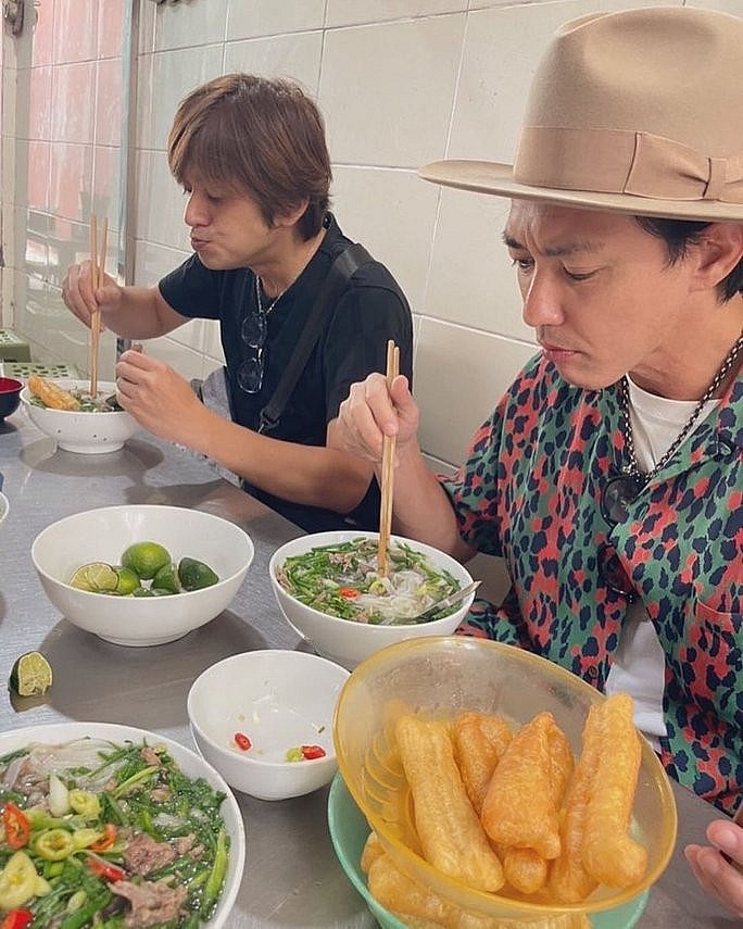 Takeru Shibaki (left) and Noboru Kaneko enjoying pho. Photo: P Takeru Shibaki (left) and Noboru Kaneko enjoying pho. Photo: P