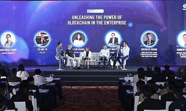A talkshow held within the framework of Vietnam Blockchain Summit 2022. Photo: VNA A talkshow held within the framework of Vietnam Blockchain Summit 2022. Photo: VNA