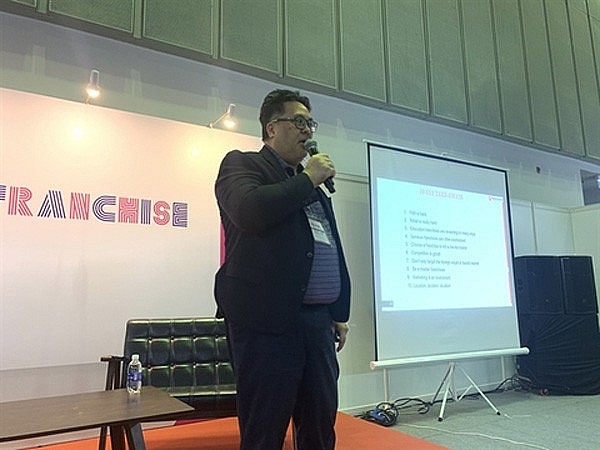 Sean Ngo, a speaker at a conference on franchising held at the 2022 Vietnam Retail-Tech and Franchise Expo. Sean Ngo, a speaker at a conference on franchising held at the 2022 Vietnam Retail-Tech and Franchise Expo.