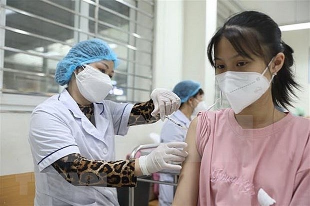 Covid-19 vaccination. Photo: VNA Covid-19 vaccination. Photo: VNA