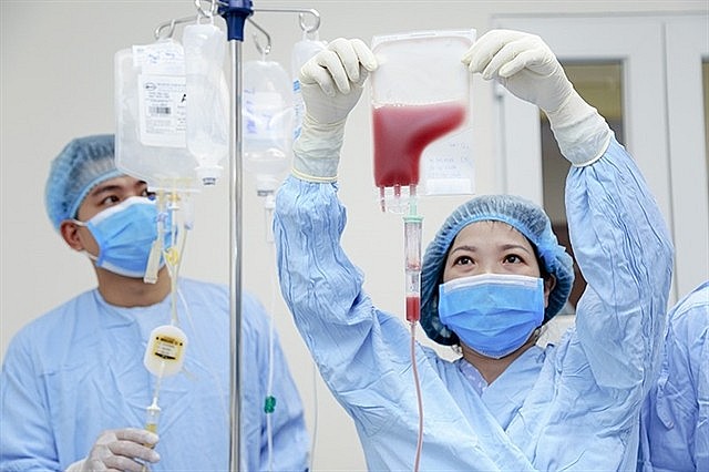 Blood research scientists at the National Institute of Hematology and Blood Transfusion in Hà Nội. Photo Cong Thang Blood research scientists at the National Institute of Hematology and Blood Transfusion in Hà Nội. Photo Cong Thang