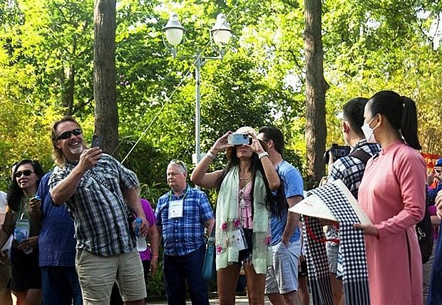 Foreigners visit Ho Chi Minh City. Photo: VNA