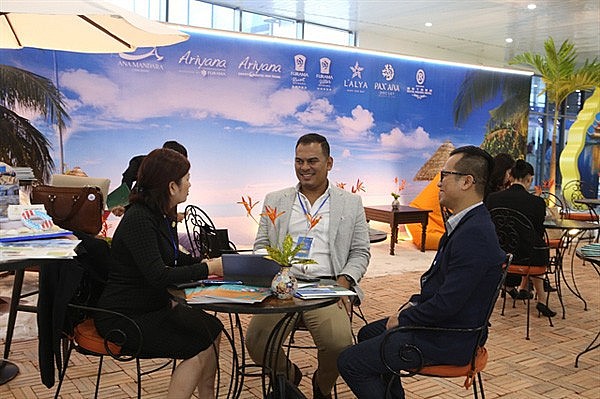 Buyers from domestic and international exchange tour service at the Vietnam International Travel Mart in Da Nang. More than 350 buyers gathered at the three-day event. Photo: Le Lam Buyers from domestic and international exchange tour service at the Vietnam International Travel Mart in Da Nang. More than 350 buyers gathered at the three-day event. Photo: Le Lam