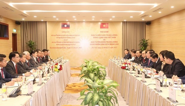 Vietnamese, Lao Parties Share Experiences in Information, Education Work Vietnamese, Lao Parties Share Experiences in Information, Education Work