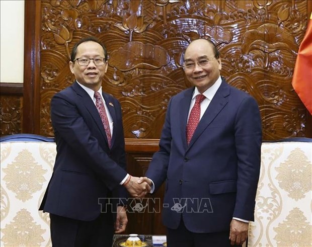 President Nguyen Xuan Phuc (R) and Cambodian Ambassador Chay Navuth. Photo: VNA President Nguyen Xuan Phuc (R) and Cambodian Ambassador Chay Navuth. Photo: VNA