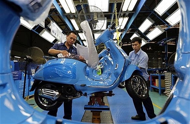 Motorbike production line of Piaggio Vietnam's factory in Binh Xuyen Industrial Park, Vinh Phuc Province. (Photo: VNA) Motorbike production line of Piaggio Vietnam's factory in Binh Xuyen Industrial Park, Vinh Phuc Province. (Photo: VNA)
