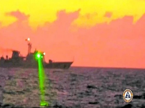 Chinese Ship Harasses Philippine Coast Guard Vessel with Laser in South China Sea Chinese Ship Harasses Philippine Coast Guard Vessel with Laser in South China Sea