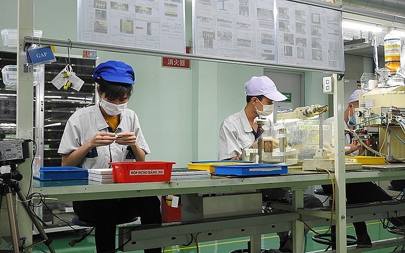 Workers assemble products at Vietnam Tabuchi Electric in Bac Ninh Province. Workers assemble products at Vietnam Tabuchi Electric in Bac Ninh Province.
