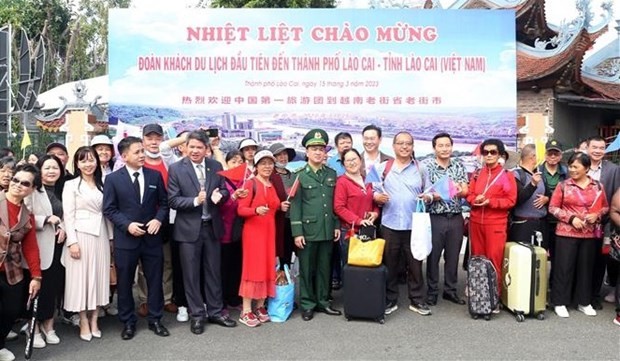Mong Cai International Border Gate welcomes the first foreign tourist group post COVID-19 on March 15. Photo: VNA Mong Cai International Border Gate welcomes the first foreign tourist group post COVID-19 on March 15. Photo: VNA