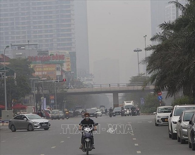 Air quality in the northern region reaches unhealthy levels on Monday morning. Photo: VNA Air quality in the northern region reaches unhealthy levels on Monday morning. Photo: VNA