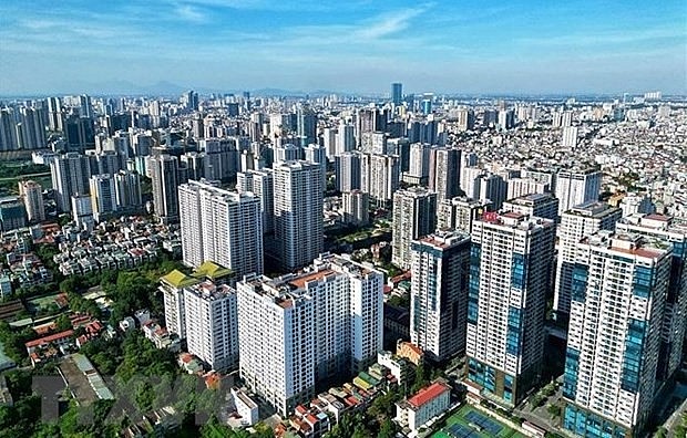 Rising demand for housing in urban areas in the 2021-2030, along with the Vietnamese government’s new policies on land, market transparency and bond issuances, is expected to spur the development of real estate market. (Photo: VNA) Rising demand for housing in urban areas in the 2021-2030, along with the Vietnamese government’s new policies on land, market transparency and bond issuances, is expected to spur the development of real estate market. (Photo: VNA)