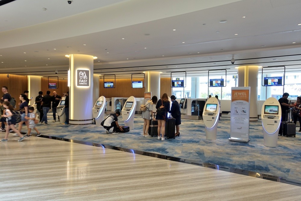 Quầy làm thủ tục sớm tại Sân bay Changi Singapore (Ảnh: KT). Quầy làm thủ tục sớm tại Sân bay Changi Singapore (Ảnh: KT).