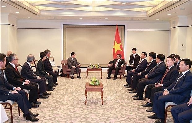 PM Pham Minh Chinh (R) receives representatives of the Japan - Vietnam Friendship Association of Hiroshima prefecture on May 19. (Photo: VNA) PM Pham Minh Chinh (R) receives representatives of the Japan - Vietnam Friendship Association of Hiroshima prefecture on May 19. (Photo: VNA)