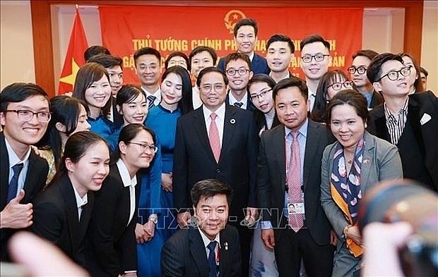 Prime Minister Pham Minh Chinh meets with Vietnamese community in Japan on May 19 (Photo: VNA) Prime Minister Pham Minh Chinh meets with Vietnamese community in Japan on May 19 (Photo: VNA)
