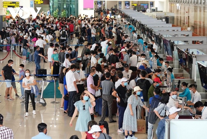 Passengers at Noi Bai International Airport Passengers at Noi Bai International Airport