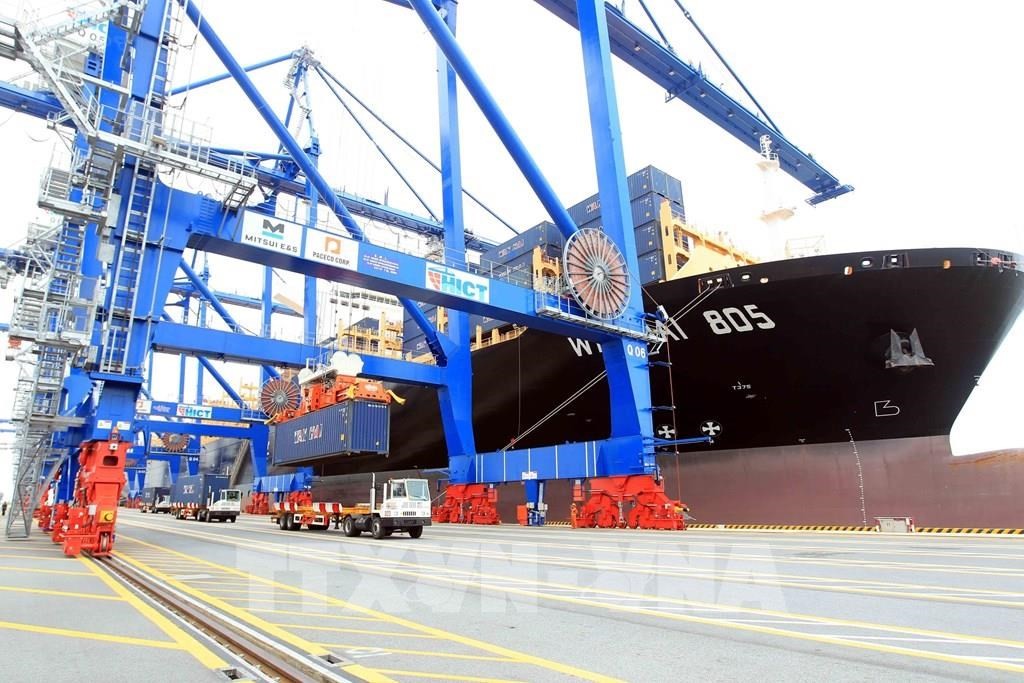 Loading and unloading activities at Hai Phong port. Photo: VNA Loading and unloading activities at Hai Phong port. Photo: VNA