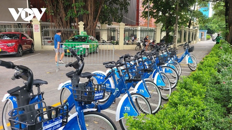 At a public bicycle sharing point on Dao Tan street. At a public bicycle sharing point on Dao Tan street.