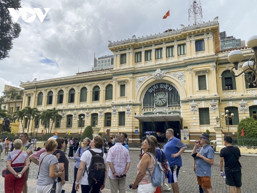International tourists visit Saigon Central Post Office in Ho Chi Minh City International tourists visit Saigon Central Post Office in Ho Chi Minh City
