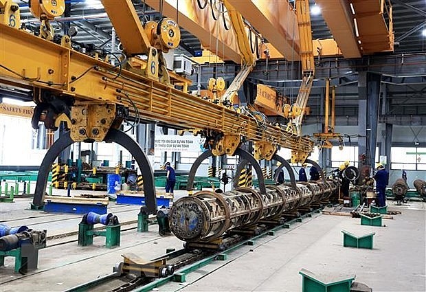 Producing concrete piles at a factory in Phu My 3 Industrial Park, Ba Ria - Vung Tau province (Photo: VNA) Producing concrete piles at a factory in Phu My 3 Industrial Park, Ba Ria - Vung Tau province (Photo: VNA)