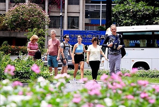 Foreign tourists visit Ho Chi Minh City. (Photo: VNA) Foreign tourists visit Ho Chi Minh City. (Photo: VNA)