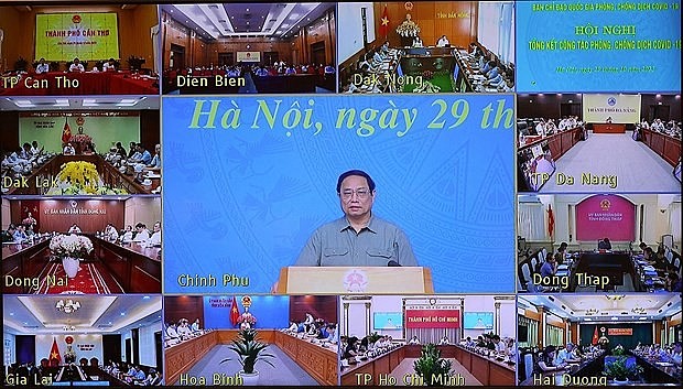 PM Pham Minh Chinh (centre) speaks at the national hybrid conference on October 29. (Photo: VNA) PM Pham Minh Chinh (centre) speaks at the national hybrid conference on October 29. (Photo: VNA)