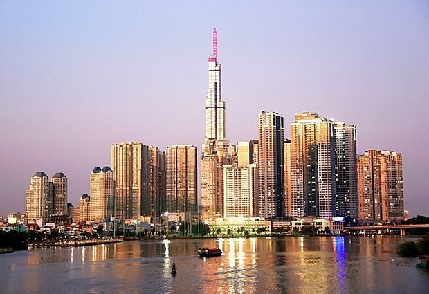 A part of HCM City. The city takes the lead with 244 UK-financed projects with capital totalling over 909 million USD or equivalent to 21.6% of the total UK investment in Vietnam. (Photo: VNA) A part of HCM City. The city takes the lead with 244 UK-financed projects with capital totalling over 909 million USD or equivalent to 21.6% of the total UK investment in Vietnam. (Photo: VNA)