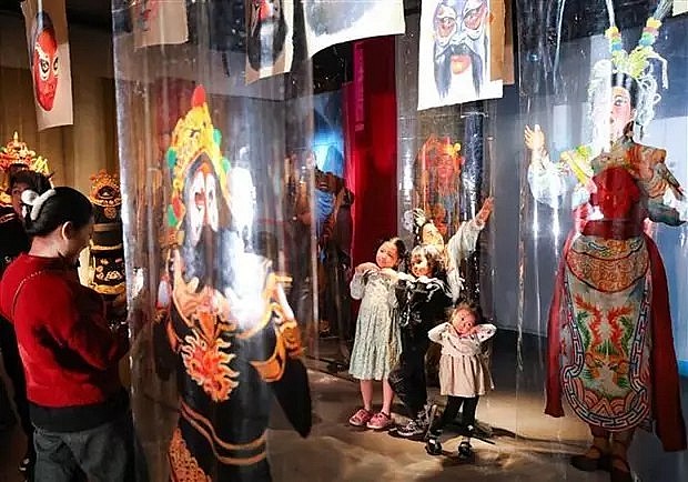 Visitors at the exhibition introducing tuong (classical drama). (Source: VNA) Visitors at the exhibition introducing tuong (classical drama). (Source: VNA)