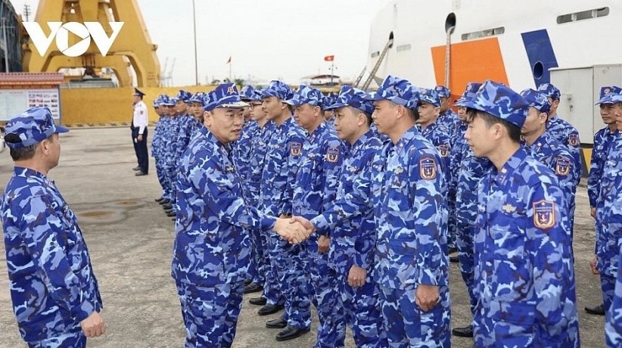 Members of the Vietnam Coast Guard force in a joint patrol at sea with their counterparts of the China Coast Guard force. Members of the Vietnam Coast Guard force in a joint patrol at sea with their counterparts of the China Coast Guard force.