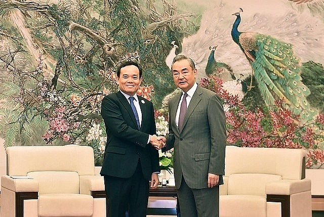 Deputy Prime Minister Tran Luu Quang (L) and Chinese Foreign Minister Wang Yi. Deputy Prime Minister Tran Luu Quang (L) and Chinese Foreign Minister Wang Yi.