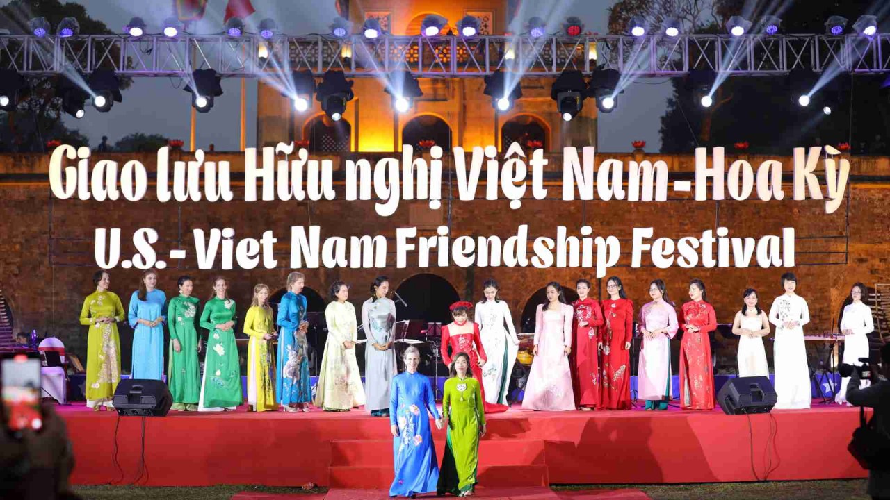 VUFO and US Embassy officials showcase ao dai collection by designer Lan Anh.