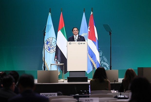 PM Pham Minh Chinh delivers a speech at the G77 summit on climate change in Dubai on December 2 afternoon. (Photo: VNA) PM Pham Minh Chinh delivers a speech at the G77 summit on climate change in Dubai on December 2 afternoon. (Photo: VNA)