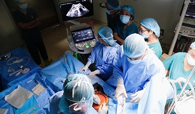 Doctors performed the foetal cardiac intervention on January 4. — Photo Courtesy of HCM City's Department of Health Doctors performed the foetal cardiac intervention on January 4. — Photo Courtesy of HCM City's Department of Health