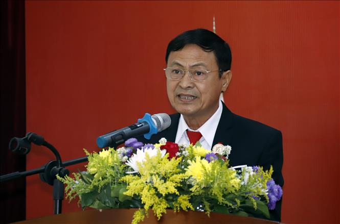 Người Việt tại Lào gắn kết dựng xây đất nước, vun đắp tình hữu nghị Chú thích ảnh