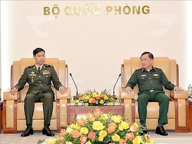 Deputy Minister of National Defence Sen. Lieut. Gen Hoang Xuan Chien (R) and newly-appointed Cambodian Military Attaché in Vietnam Maj. Gen. Leang Sovannara in Hanoi on March 27. (Photo: VNA) Deputy Minister of National Defence Sen. Lieut. Gen Hoang Xuan Chien (R) and newly-appointed Cambodian Military Attaché in Vietnam Maj. Gen. Leang Sovannara in Hanoi on March 27. (Photo: VNA)