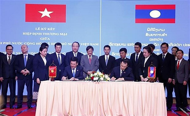 Vietnam And Laos Sign New Trade Agreement Vietnam And Laos Sign New Trade Agreement