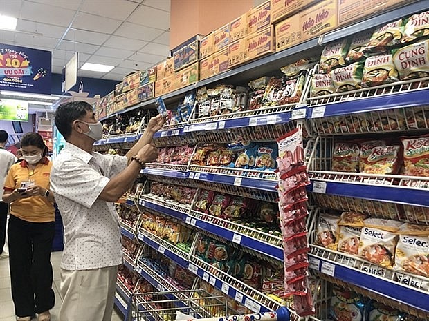 Customers shop at a supermarket in HCM City. Several key macro trends are shaping Vietnam's FMCG landscape in 2024 and beyond. (Photo: VNA) Customers shop at a supermarket in HCM City. Several key macro trends are shaping Vietnam's FMCG landscape in 2024 and beyond. (Photo: VNA)