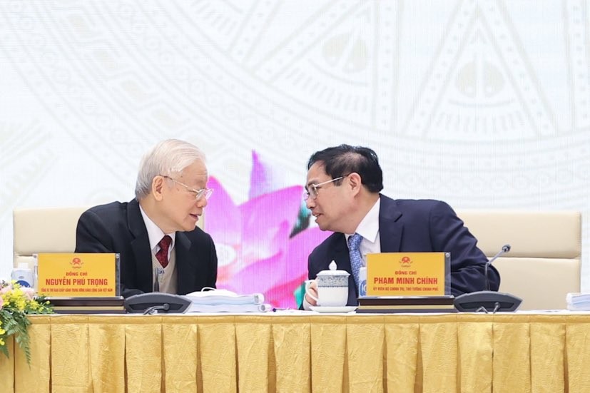 Tổng Bí thư Nguyễn Phú Trọng trao đổi với Thủ tướng Phạm Minh Chính tại Hội nghị Chính phủ với địa phương vào tháng 1/2022 - Ảnh VGP/Nhật Bắc Tổng Bí thư Nguyễn Phú Trọng trao đổi với Thủ tướng Phạm Minh Chính tại Hội nghị Chính phủ với địa phương vào tháng 1/2022 - Ảnh VGP/Nhật Bắc