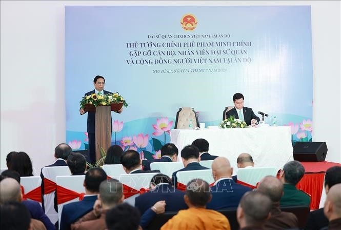 Thủ tướng Phạm Minh Chính phát biểu tại buổi gặp gỡ cán bộ, nhân viên Đại sứ quán và cộng đồng người Việt Nam tại Ấn Độ. Ảnh: TTXVN Thủ tướng Phạm Minh Chính phát biểu tại buổi gặp gỡ cán bộ, nhân viên Đại sứ quán và cộng đồng người Việt Nam tại Ấn Độ. Ảnh: TTXVN