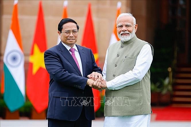Prime Minister Pham Minh Chinh and his Indian counterpart Narendra Modi. (Photo: VNA) Prime Minister Pham Minh Chinh and his Indian counterpart Narendra Modi. (Photo: VNA)